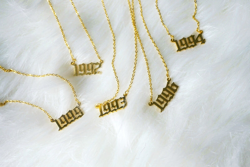 Est.. necklace